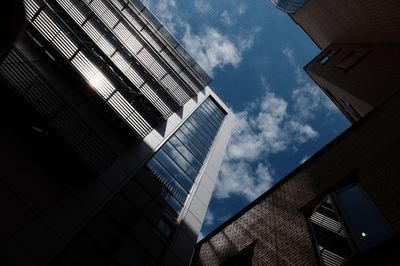 Low angle view of modern building against sky