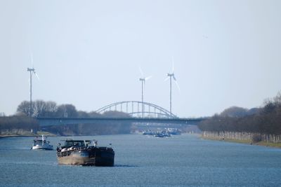 Ship in water against clear sky