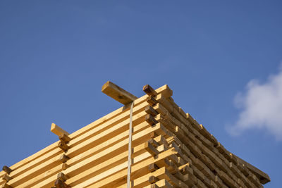 Low angle view of building against blue sky