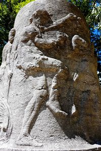 Low angle view of statue on rock