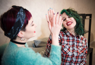 Two young women smiling