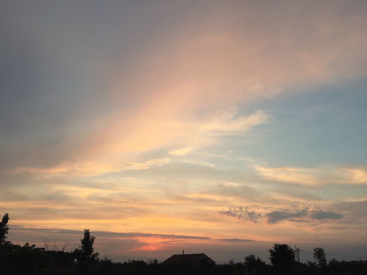 sunset, silhouette, scenics, sky, beauty in nature, tranquil scene, tranquility, tree, orange color, nature, cloud - sky, idyllic, low angle view, cloud, landscape, dramatic sky, outdoors, no people, non-urban scene, majestic