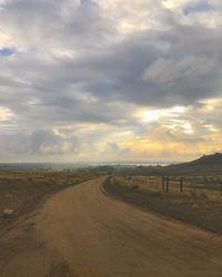 Road against sky during sunset