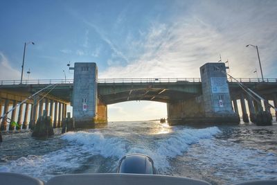 Bridge over sea against sky
