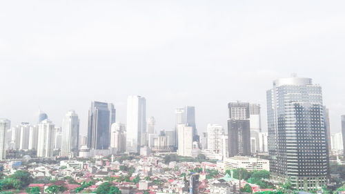 View of cityscape against clear sky