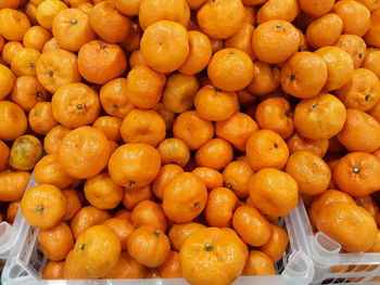 Full frame shot of oranges in market