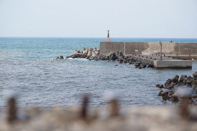Scenic view of sea against clear sky