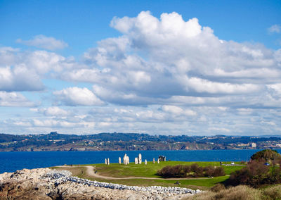 Scenic view of beach against sky