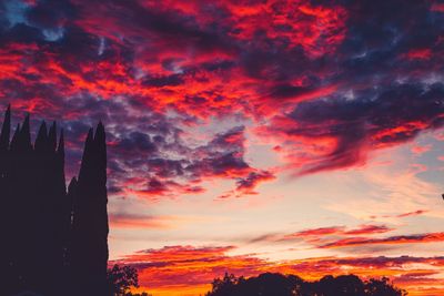 Low angle view of dramatic sky during sunset