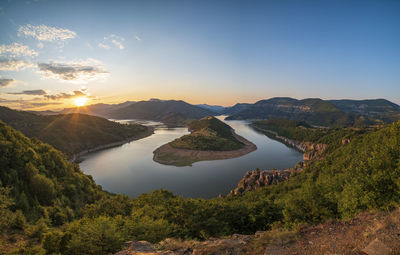 Scenic view of mountains against sky during sunset