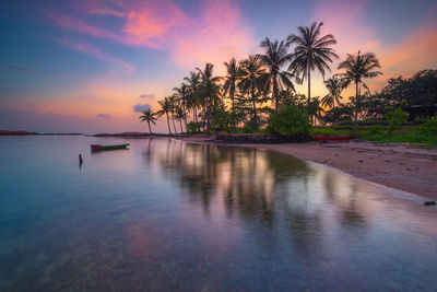 Scenic view of sea against sky at sunset