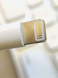 Very close up shot of a lighting and charging cable