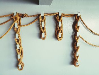 Close-up of clothes hanging on wall