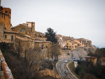 High angle view of buildings against clear sky