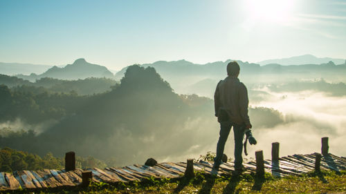 Tourist standing on mountain