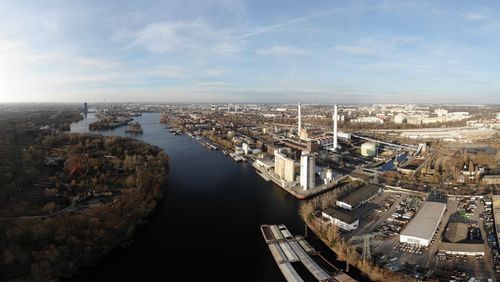 High angle view of river amidst buildings in city