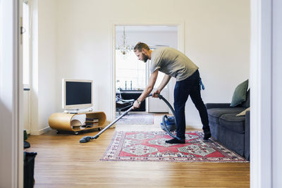 Man working on floor at home