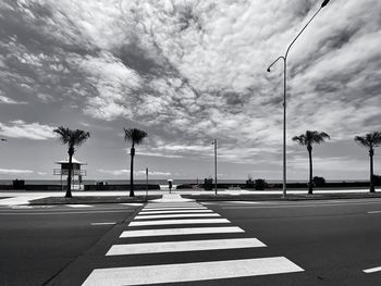 View of road sign against sky