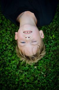 Portrait of cute girl lying on floor