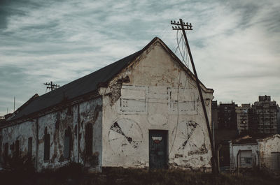 Low angle view of old building against sky