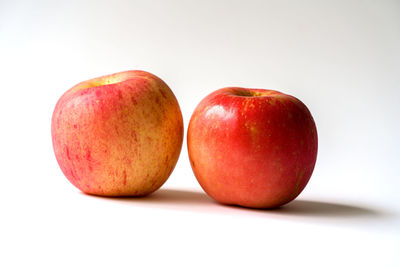 Close-up of apple against white background