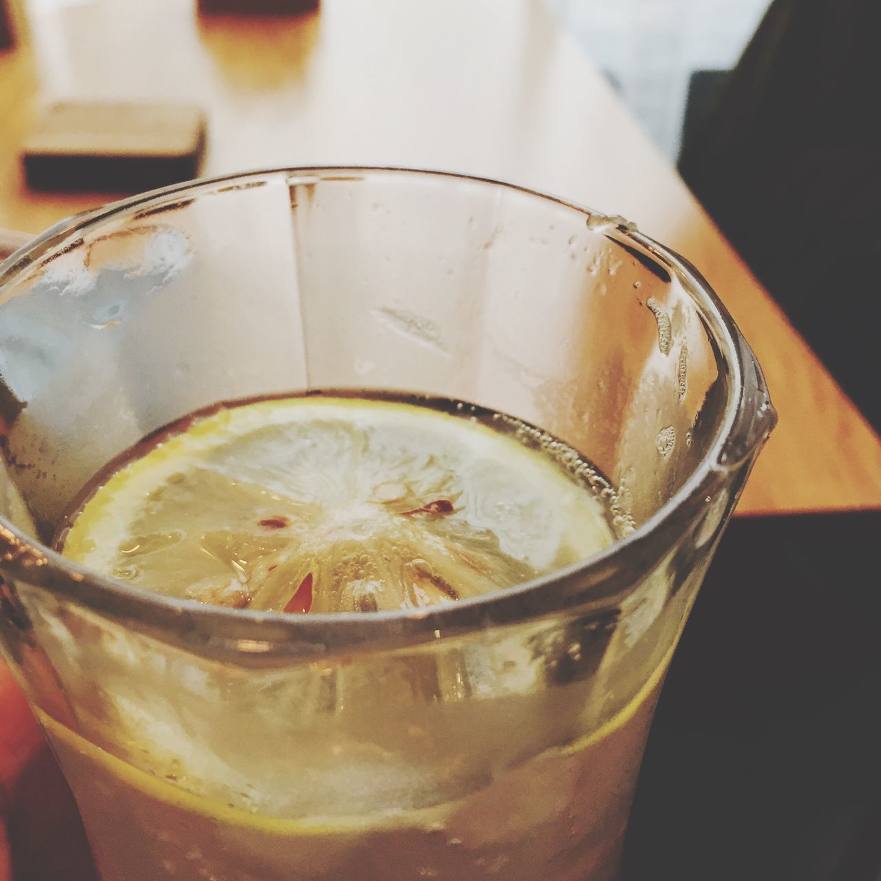 food and drink, drink, indoors, freshness, close-up, refreshment, drinking glass, glass - material, table, focus on foreground, still life, transparent, cold temperature, alcohol, no people, ice cube, healthy eating, glass, ice, selective focus