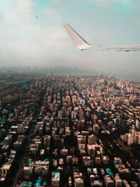 View of cityscape seen through airplane