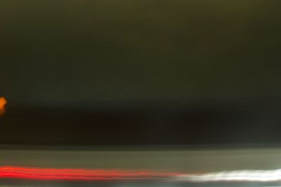Scenic view of sea against sky at night
