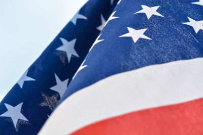 Close-up of flag against sky