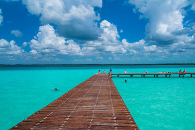 Pier over the wonderful turquoise water in the bacalar lagoon, mexico