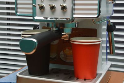 Close-up of coffee served on table at cafe