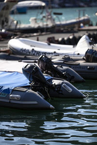 Boats moored at harbor