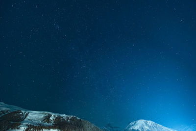 Low angle view of star field against sky at night