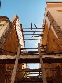 Low angle view of old building against sky