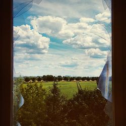 View of landscape against cloudy sky