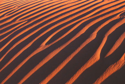 High angle view of shadow on sand