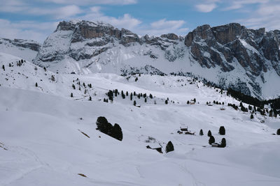 Scenic view of snowcapped mountains against sky. winter hike around seceda, south tyrol, italy