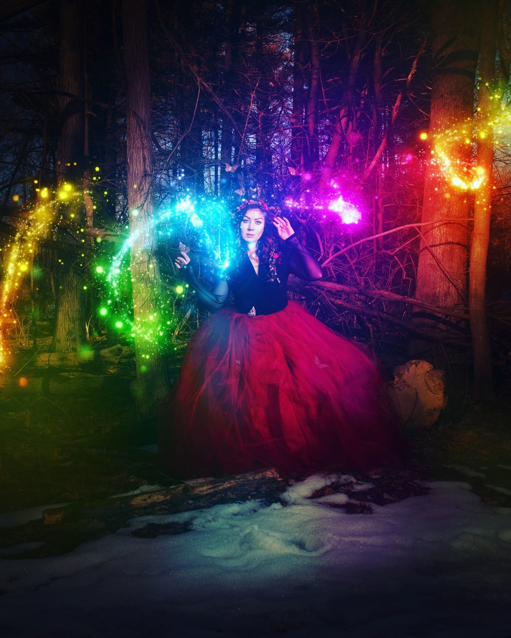 night, illuminated, celebration, light, arts culture and entertainment, darkness, multi colored, one person, tree, motion, event, lighting equipment, outdoors, nature, architecture