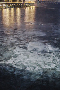 Wet road in city during winter