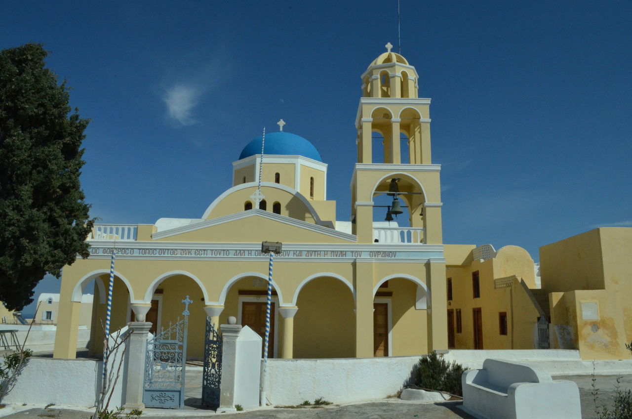 place of worship, religion, church, architecture, building exterior, spirituality, built structure, dome, blue, cathedral, cross, low angle view, facade, clear sky, arch, sky, sunlight, day