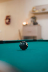 Cropped hand playing pool