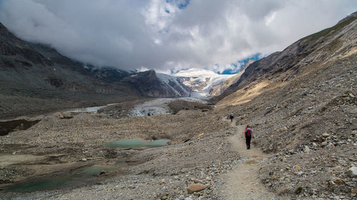 People hiking on mountain