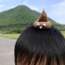 Close-up of anthropomorphic face on boy head