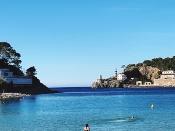 Scenic view of sea against clear blue sky