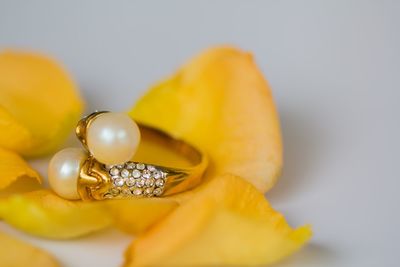 Close-up of yellow rings on table