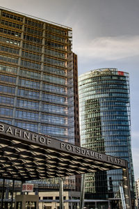 Low angle view of modern building against sky in city