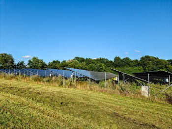 Generating clean energy with solar modules in a big park in northern europe.