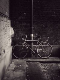 Bicycle on brick wall