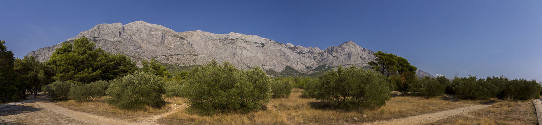 Scenic view of mountains against clear sky