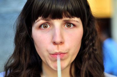 Close-up portrait of young woman